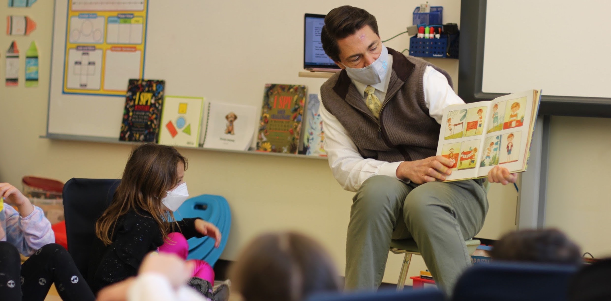 Adam Fischer reading to Grade 1